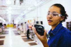 woman using handheld mobile computer