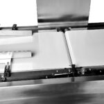Continuous In Motion Checkweigher System with Pneumatic Kick Out